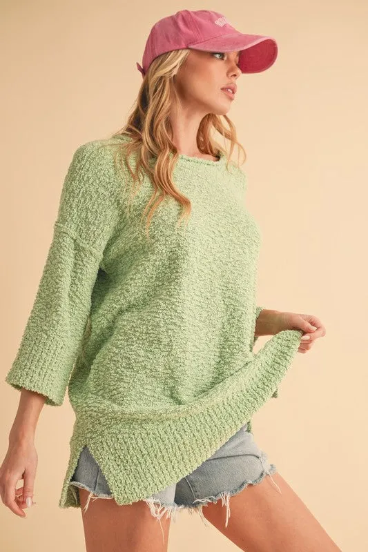 Aemi   Co Side Slit Ribbed Hem Round Neck Sweater